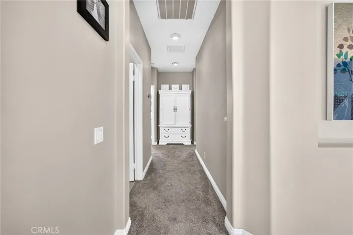 Upstairs hallway to bedrooms 16318 sun summit drive, riverside, california 92503