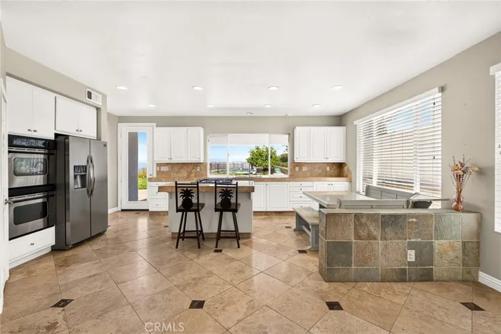 Open concept kitchen to family room 16318 sun summit drive, riverside, california 92503