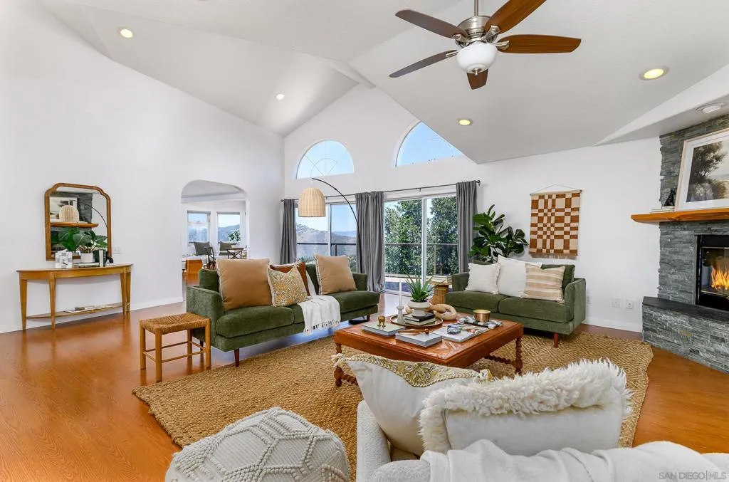 Living Room with access to expansive deck and VIEWS, VIEWS, VIEWS!