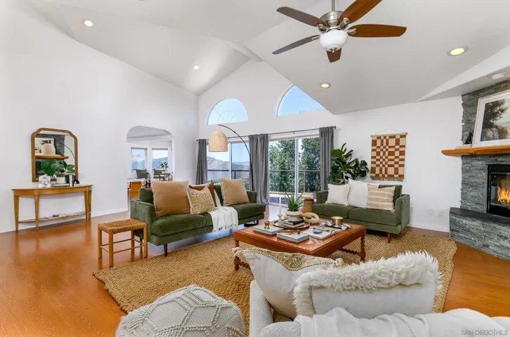 Living Room with access to expansive deck and VIEWS, VIEWS, VIEWS!