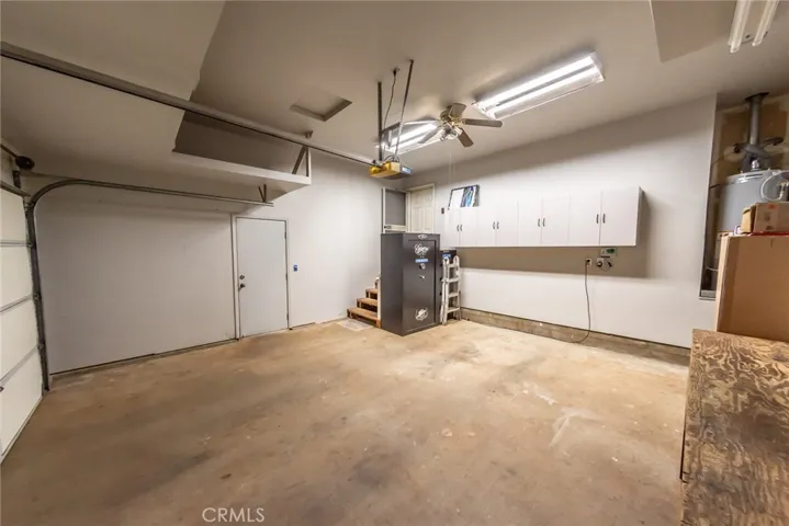 Overhead storage above garage door