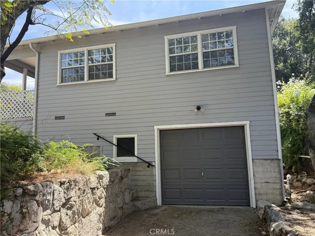 Side of the House with a One Car Garage