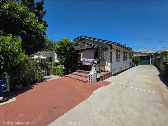 Front of the house with long driveway
