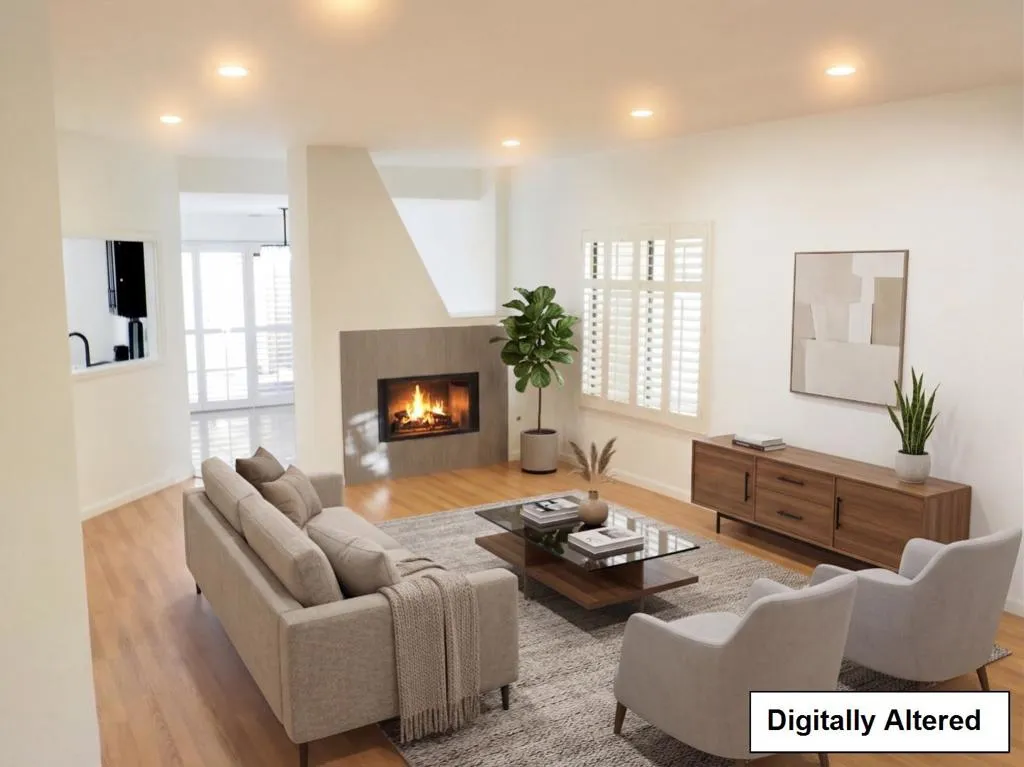 Main floor living room with gas log fireplace