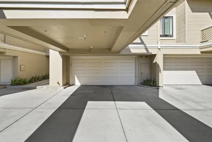 2 car sheetrocked garage with storage unit and automatice door