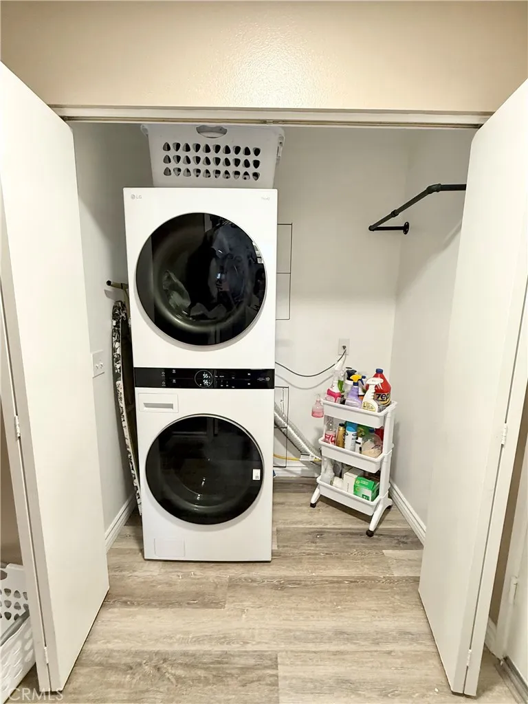 Laundry Area with the stacked washer and dryer that come with this home!