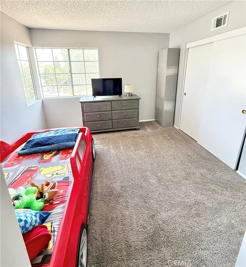 Bedroom #2 is spacious and again all the natural lighting is amazing in this home!
