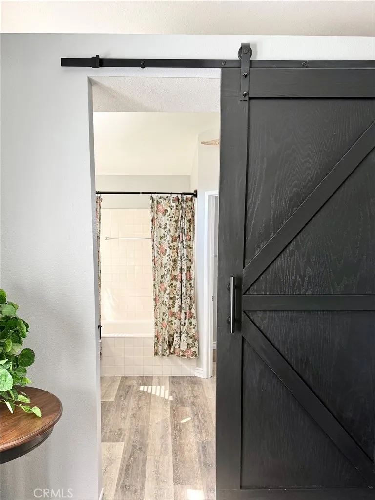 Through the Barn Door to the Master Bathroom