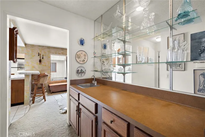   Bar with glass shelving
