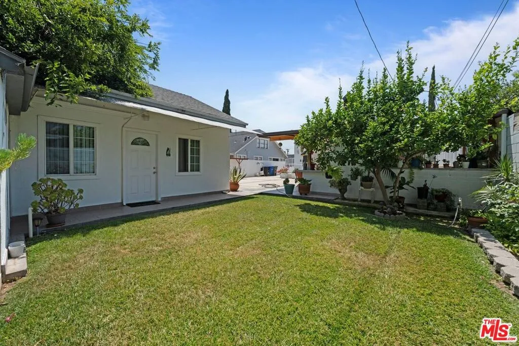 Backyard w/ Guest House entry