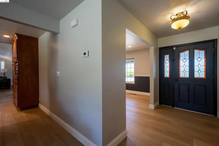 Double entry doors with decorative glass panels