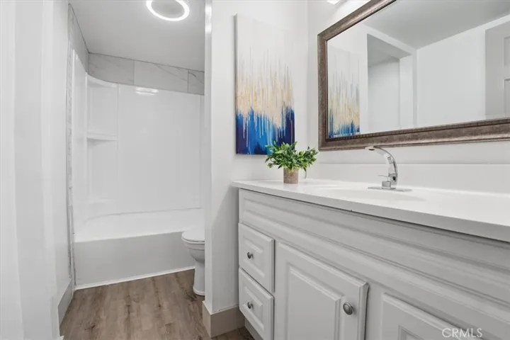 REMODELLED WITH MOSAIC TILE INLAYS
