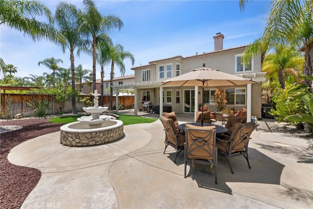 Large backyard tastefully remodeled with turf.