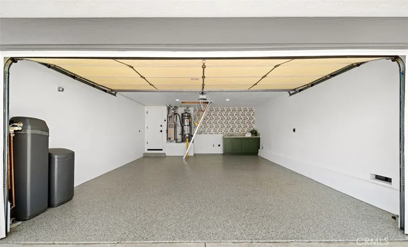 Even the garage is NICE! Overhead storage, laundry room.