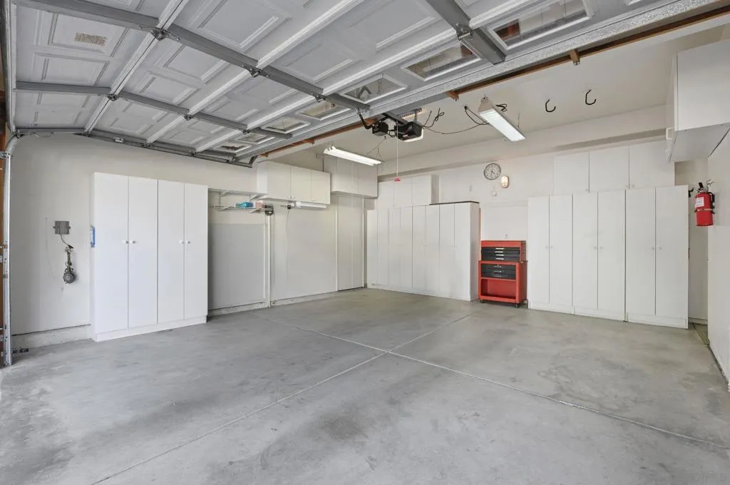 Large 2 Car Garage with plenty of storage area.
