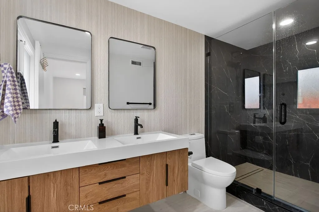 Primary bathroom featuring modern, high-end upgrades and contemporary finishes.