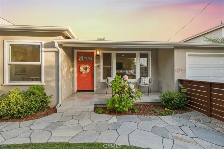 Inviting front porch and Dutch door entry