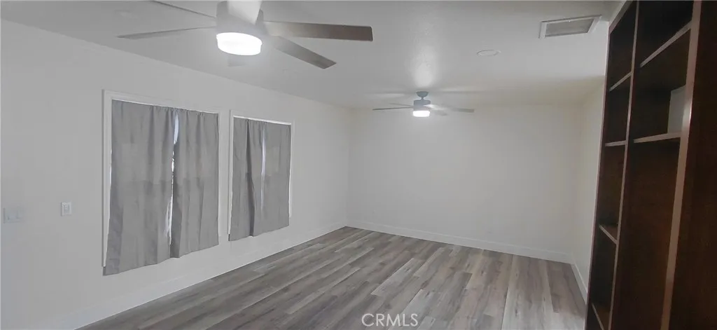 Living room from hallway curtains closed