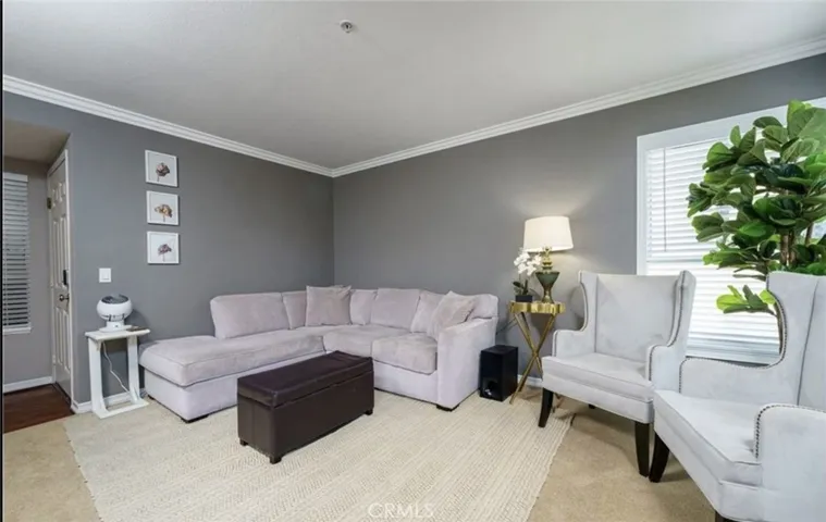 The living room has a beautiful fireplace