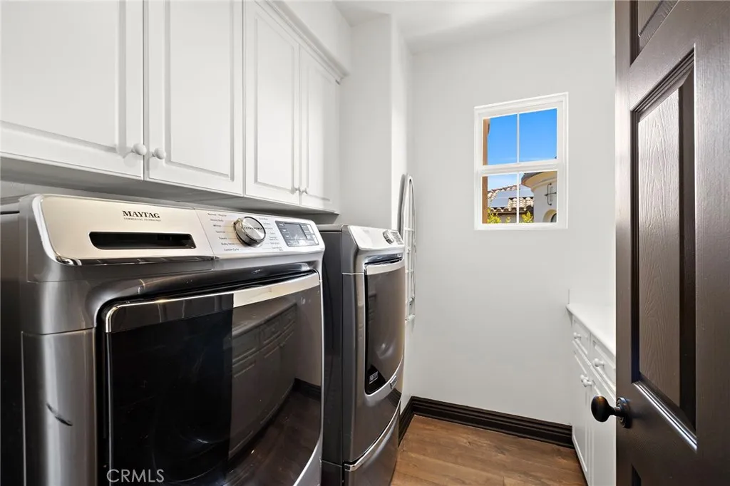 upstairs laundry with sink