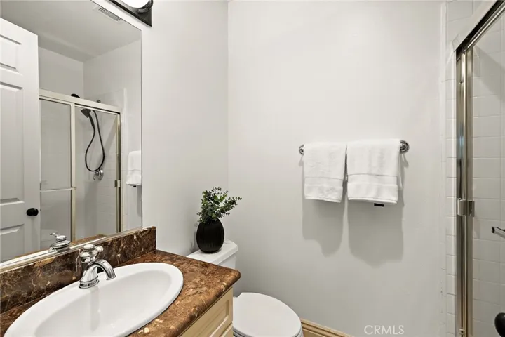 ensuite full bathroom with walk in shower