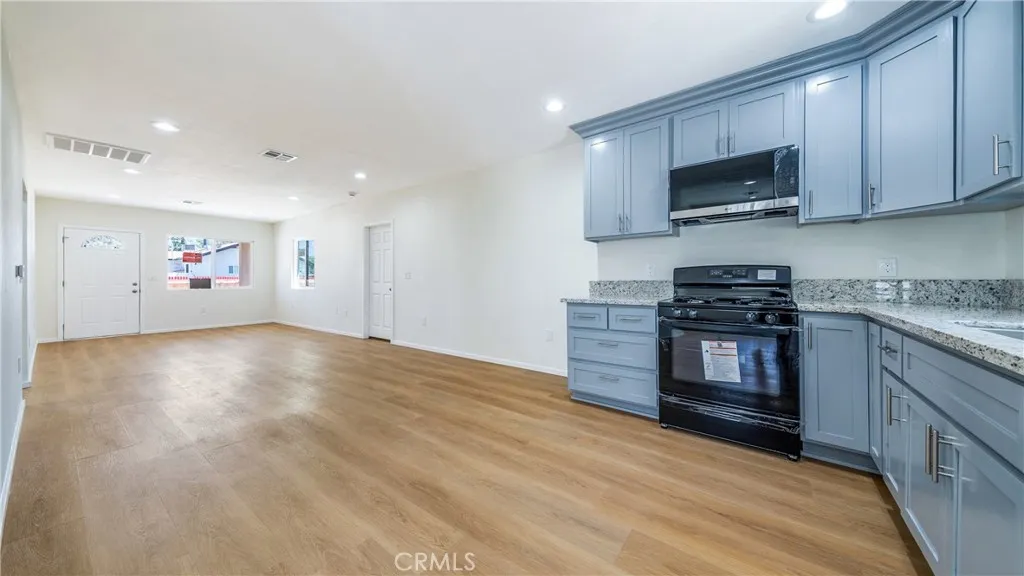 Main home Kitchen with livingroom view.