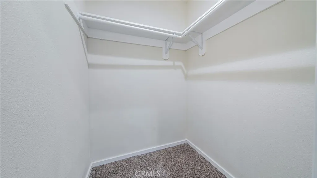 Main home walk-in closet in master's bedroom