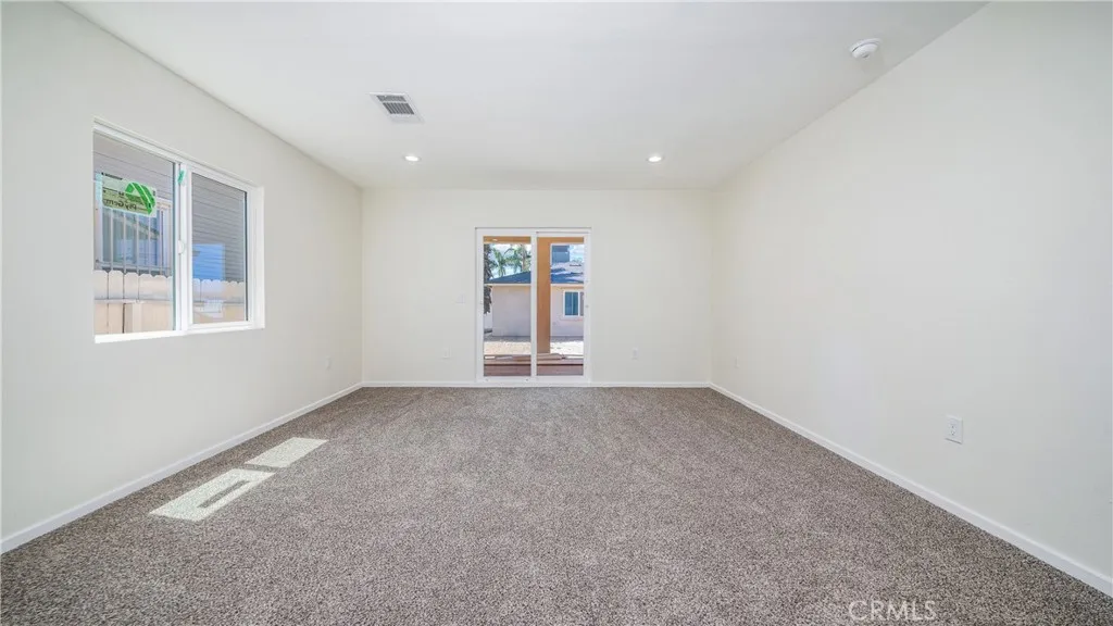Master's Bedroom in Main home. Has sliding door leading to deck. Also has