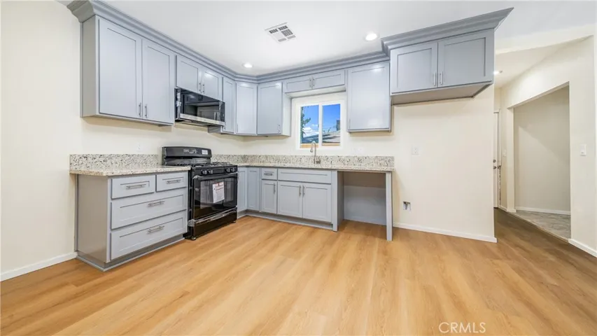 Main home kitchen. Adjacent to dining room.