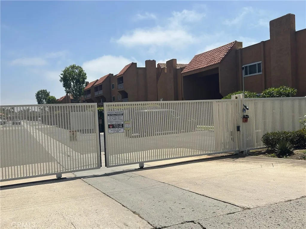 Great 1 bedroom, 1 bath, 754 sq foot down unit 2 miles from the beach, gated community, 1 carport, large rooms and a fantastic quiet relaxing outdoor space 3 times the normal size of balconies, with some utilities included and nice pool, spa, and clubhouse.