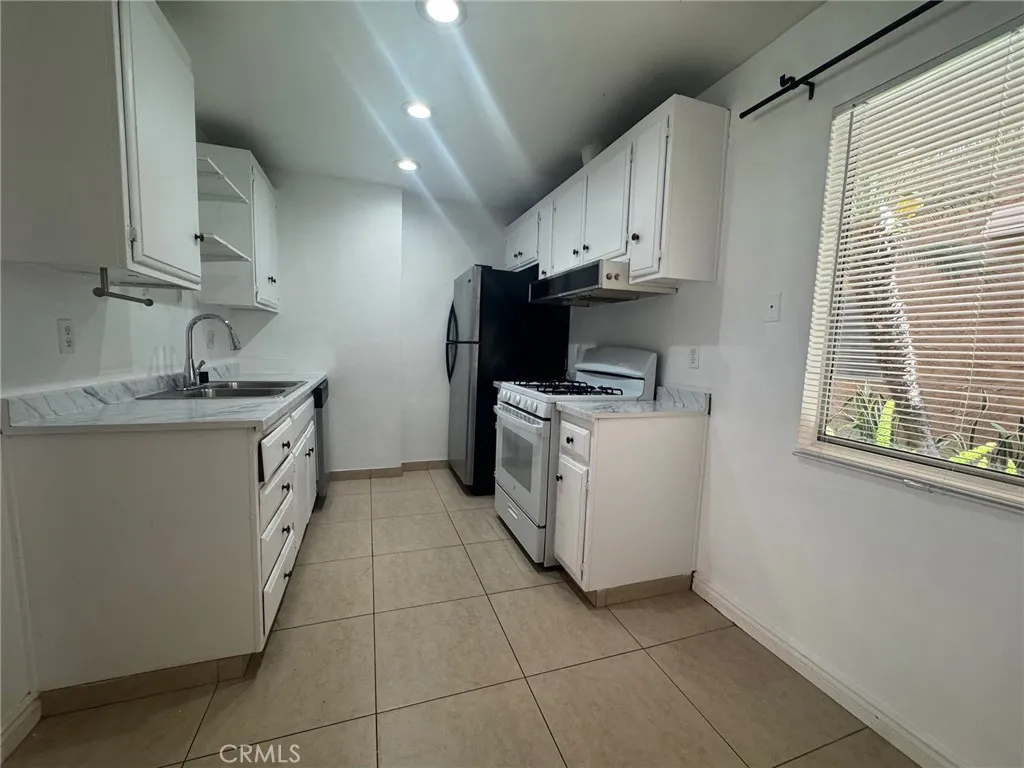 Great 1 bedroom, 1 bath, 754 sq foot down unit 2 miles from the beach, gated community, 1 carport, large rooms and a fantastic quiet relaxing outdoor space 3 times the normal size of balconies, with some utilities included and nice pool, spa, and clubhouse.
