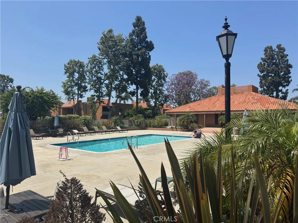 Great 1 bedroom, 1 bath, 754 sq foot down unit 2 miles from the beach, gated community, 1 carport, large rooms and a fantastic quiet relaxing outdoor space 3 times the normal size of balconies, with some utilities included and nice pool, spa, and clubhouse.