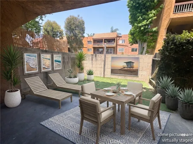 Great 1 bedroom, 1 bath, 754 sq foot down unit 2 miles from the beach, gated community, 1 carport, large rooms and a fantastic quiet relaxing outdoor space 3 times the normal size of balconies, with some utilities included and nice pool, spa, and clubhouse.