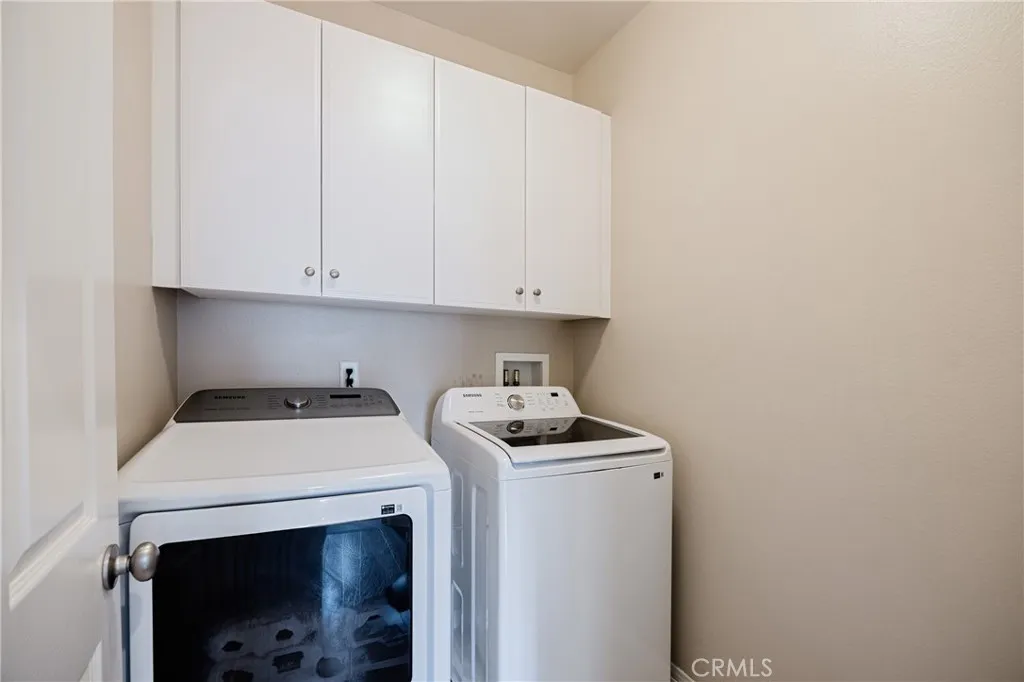 Upstairs laundry room.