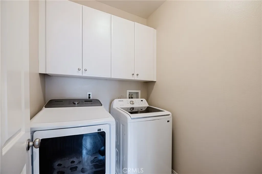 Upstairs laundry room.