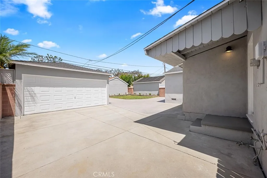 Two-car garage equipped with new garage door opener.