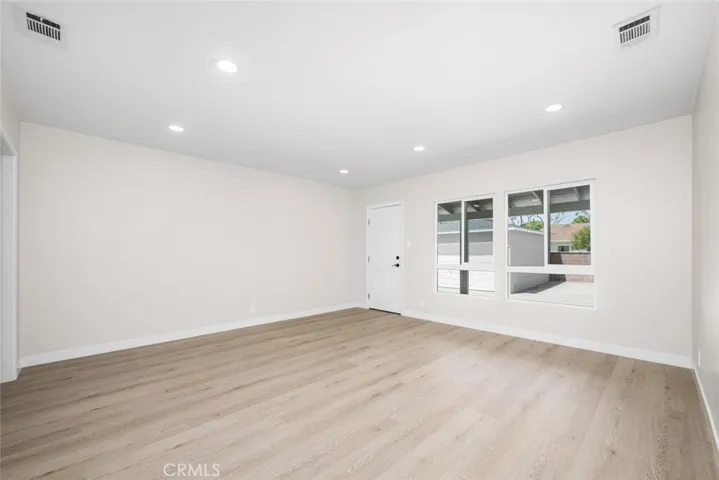 Recessed lighting brings added brightness and a contemporary touch to the interior.