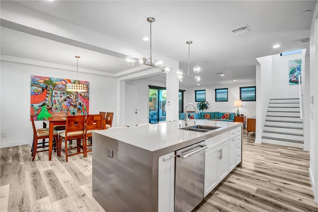 Kitchen opens to dining room and family room