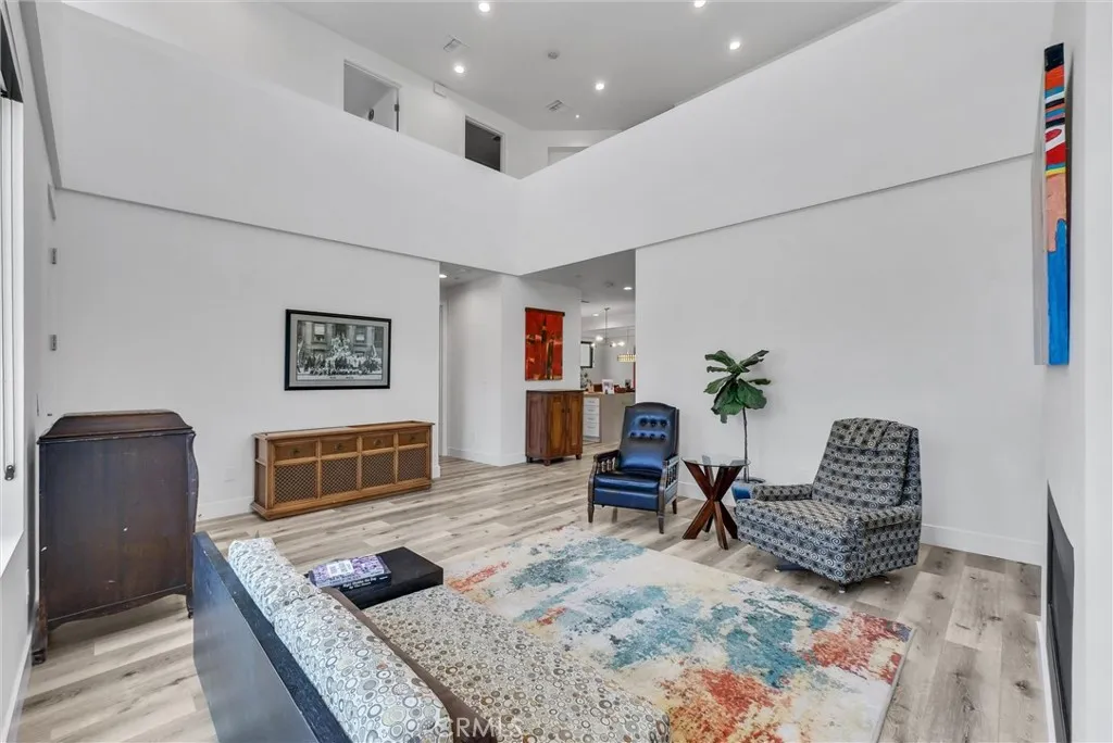 Living room with view of upper level