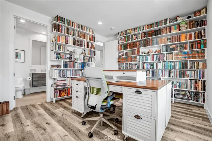 Lower bedroom with full bathroom used as office