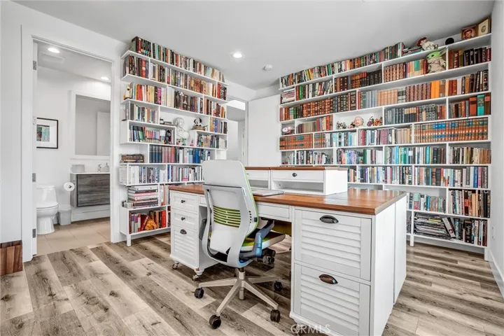 Lower bedroom with full bathroom used as office