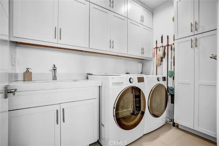 Laundry with custom cabinetry