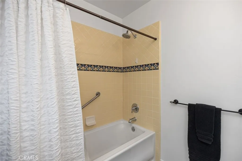 Updated bathroom with Spanish tiles.
