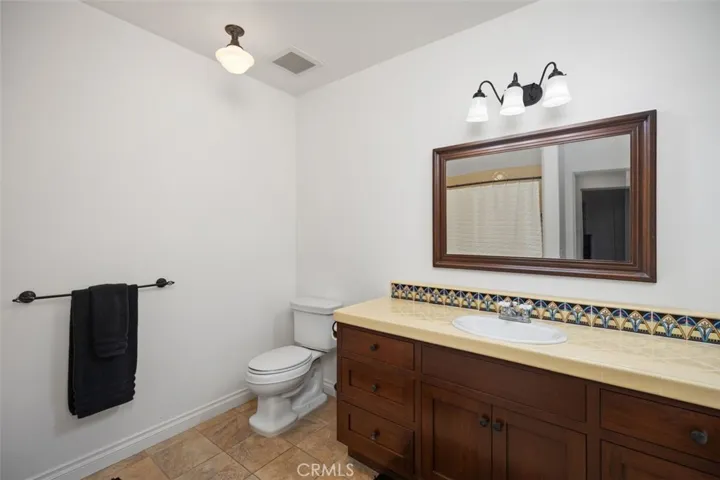 Updated bathroom with Spanish tiles.