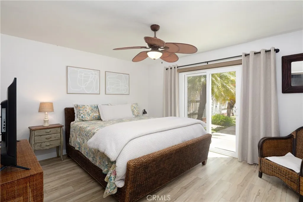 Primary bedroom with sliding door to back patio