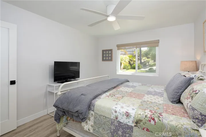 Second bedroom with view of backyard
