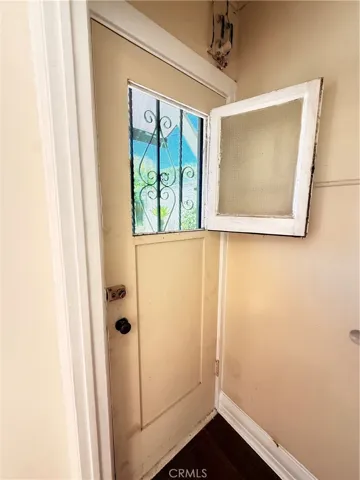 Bedroom#3 Door to Backyard.