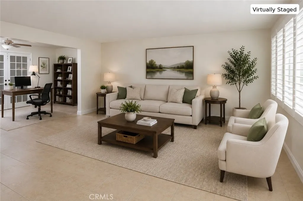 Virtually staged living room and den