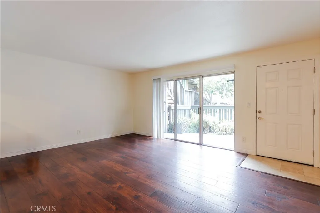 Living Room to front entrance and patio