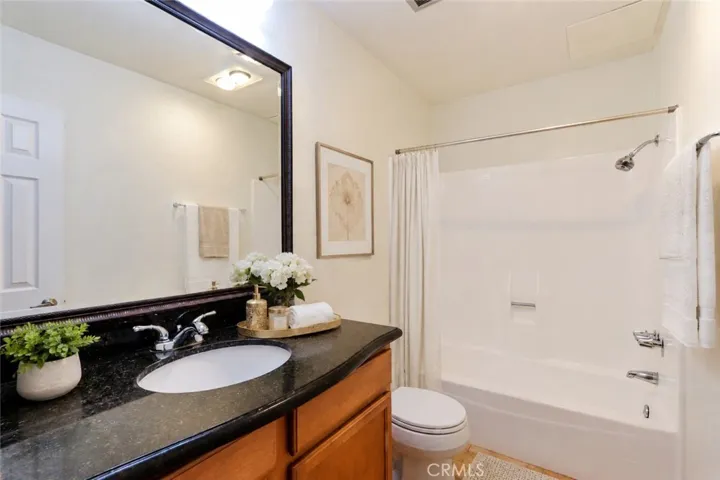 Hall Bath serving 2nd & 3rd Bedrooms
Virtually staged photo